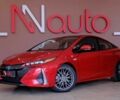 Красный Тойота Приус, объемом двигателя 1.8 л и пробегом 63 тыс. км за 22568 $, фото 1 на Automoto.ua