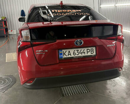 Красный Тойота Приус, объемом двигателя 1.8 л и пробегом 74 тыс. км за 17500 $, фото 1 на Automoto.ua