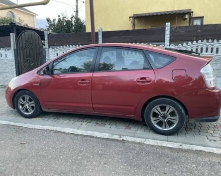 Красный Тойота Приус, объемом двигателя 1.5 л и пробегом 300 тыс. км за 2700 $, фото 1 на Automoto.ua