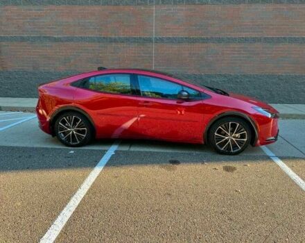 Красный Тойота Приус, объемом двигателя 2 л и пробегом 10 тыс. км за 12000 $, фото 3 на Automoto.ua