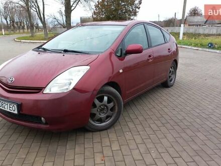 Красный Тойота Приус, объемом двигателя 1.5 л и пробегом 226 тыс. км за 6500 $, фото 1 на Automoto.ua