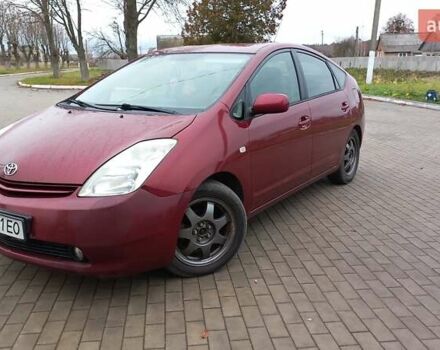 Красный Тойота Приус, объемом двигателя 1.5 л и пробегом 226 тыс. км за 6500 $, фото 1 на Automoto.ua