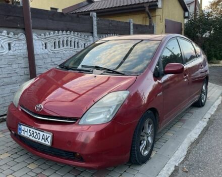 Красный Тойота Приус, объемом двигателя 1.5 л и пробегом 300 тыс. км за 2700 $, фото 1 на Automoto.ua