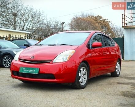 Красный Тойота Приус, объемом двигателя 1.5 л и пробегом 141 тыс. км за 9600 $, фото 1 на Automoto.ua