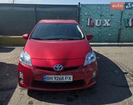 Красный Тойота Приус, объемом двигателя 1.8 л и пробегом 300 тыс. км за 8300 $, фото 1 на Automoto.ua