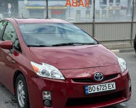 Красный Тойота Приус, объемом двигателя 1.8 л и пробегом 320 тыс. км за 10300 $, фото 1 на Automoto.ua
