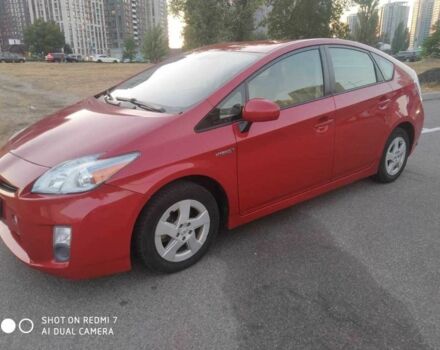 Красный Тойота Приус, объемом двигателя 1.8 л и пробегом 344 тыс. км за 8930 $, фото 1 на Automoto.ua