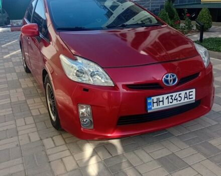 Красный Тойота Приус, объемом двигателя 1.8 л и пробегом 380 тыс. км за 7000 $, фото 1 на Automoto.ua