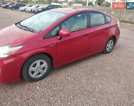 Красный Тойота Приус, объемом двигателя 1.8 л и пробегом 345 тыс. км за 8500 $, фото 1 на Automoto.ua