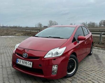 Червоний Тойота Пріус, об'ємом двигуна 1.8 л та пробігом 238 тис. км за 6990 $, фото 1 на Automoto.ua