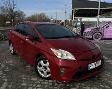 Красный Тойота Приус, объемом двигателя 1.8 л и пробегом 200 тыс. км за 5950 $, фото 1 на Automoto.ua