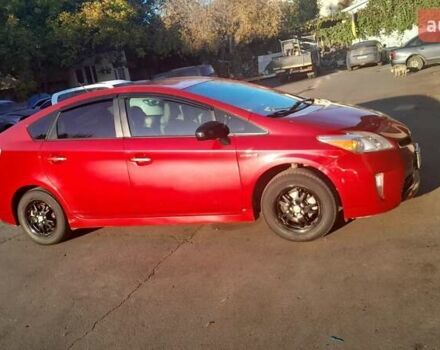 Красный Тойота Приус, объемом двигателя 1.8 л и пробегом 200 тыс. км за 10500 $, фото 1 на Automoto.ua