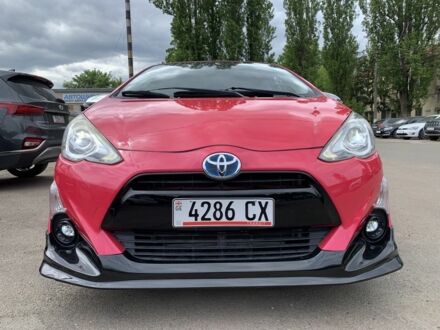 Тойота Приус 2015 в Киеве на Automoto.ua Красный Тойота Приус, объемом двигателя 1.5 л и пробегом 54 тыс. км за 10000 $, фото 1 на Automoto.ua