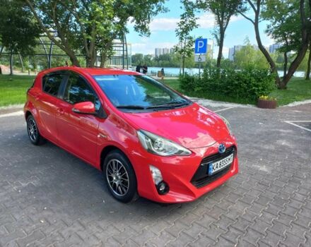 Красный Тойота Приус, объемом двигателя 1.5 л и пробегом 82 тыс. км за 11900 $, фото 1 на Automoto.ua