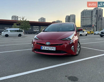Красный Тойота Приус, объемом двигателя 1.8 л и пробегом 178 тыс. км за 16000 $, фото 1 на Automoto.ua