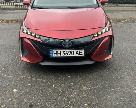 Красный Тойота Приус, объемом двигателя 1.8 л и пробегом 241 тыс. км за 16800 $, фото 1 на Automoto.ua