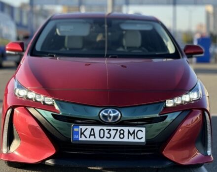 Красный Тойота Приус, объемом двигателя 1.8 л и пробегом 126 тыс. км за 19000 $, фото 1 на Automoto.ua