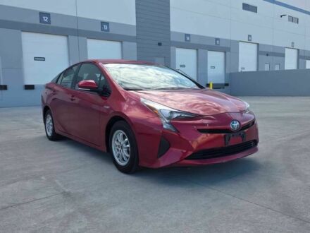 Красный Тойота Приус, объемом двигателя 1.8 л и пробегом 63 тыс. км за 7000 $, фото 1 на Automoto.ua