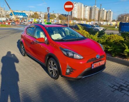 Красный Тойота Приус, объемом двигателя 1.5 л и пробегом 66 тыс. км за 14800 $, фото 1 на Automoto.ua