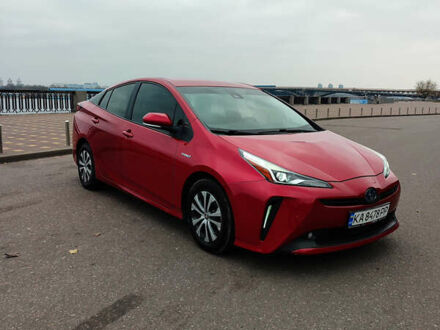 Красный Тойота Приус, объемом двигателя 1.8 л и пробегом 147 тыс. км за 19200 $, фото 1 на Automoto.ua