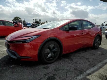 Красный Тойота Приус, объемом двигателя 2 л и пробегом 9 тыс. км за 7900 $, фото 1 на Automoto.ua