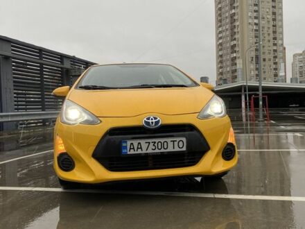 Желтый Тойота Приус, объемом двигателя 1.5 л и пробегом 173 тыс. км за 9900 $, фото 1 на Automoto.ua
