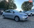 Серый Тойота Приус, объемом двигателя 1.5 л и пробегом 225 тыс. км за 6899 $, фото 1 на Automoto.ua