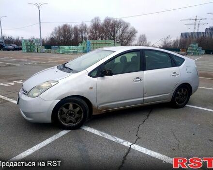 Серый Тойота Приус, объемом двигателя 1.5 л и пробегом 250 тыс. км за 4999 $, фото 1 на Automoto.ua