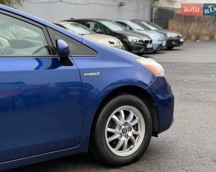 Синий Тойота Приус, объемом двигателя 1.8 л и пробегом 315 тыс. км за 10290 $, фото 13 на Automoto.ua