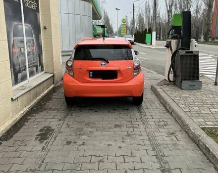 Оранжевый Тойота Приус, объемом двигателя 1.5 л и пробегом 63 тыс. км за 11500 $, фото 1 на Automoto.ua