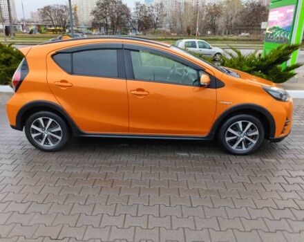 Оранжевый Тойота Приус, объемом двигателя 1.5 л и пробегом 97 тыс. км за 13400 $, фото 1 на Automoto.ua