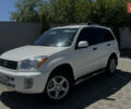 Білий Тойота РАВ 4, об'ємом двигуна 2 л та пробігом 170 тис. км за 6950 $, фото 6 на Automoto.ua
