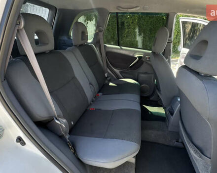 Білий Тойота РАВ 4, об'ємом двигуна 2 л та пробігом 170 тис. км за 6950 $, фото 33 на Automoto.ua