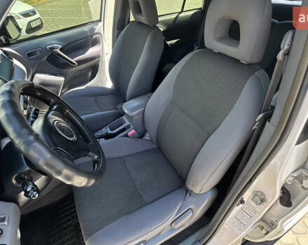 Білий Тойота РАВ 4, об'ємом двигуна 2 л та пробігом 170 тис. км за 6950 $, фото 42 на Automoto.ua