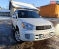 Белый Тойота РАВ 4, объемом двигателя 2 л и пробегом 166 тыс. км за 8000 $, фото 1 на Automoto.ua