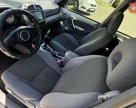 Білий Тойота РАВ 4, об'ємом двигуна 2 л та пробігом 170 тис. км за 6950 $, фото 43 на Automoto.ua