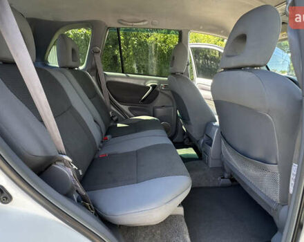 Білий Тойота РАВ 4, об'ємом двигуна 2 л та пробігом 170 тис. км за 6950 $, фото 36 на Automoto.ua