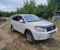 Белый Тойота РАВ 4, объемом двигателя 2.4 л и пробегом 244 тыс. км за 8900 $, фото 1 на Automoto.ua