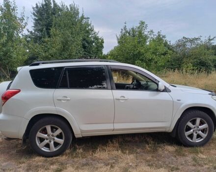 Белый Тойота РАВ 4, объемом двигателя 2.4 л и пробегом 244 тыс. км за 8900 $, фото 1 на Automoto.ua