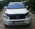 Белый Тойота РАВ 4, объемом двигателя 2.4 л и пробегом 145 тыс. км за 12 $, фото 1 на Automoto.ua