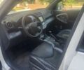 Білий Тойота РАВ 4, об'ємом двигуна 2 л та пробігом 166 тис. км за 12300 $, фото 9 на Automoto.ua