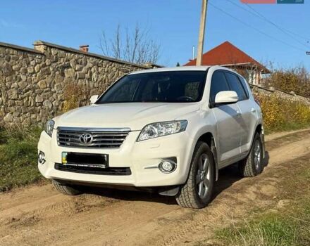 Білий Тойота РАВ 4, об'ємом двигуна 2 л та пробігом 128 тис. км за 15399 $, фото 1 на Automoto.ua