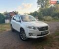 Білий Тойота РАВ 4, об'ємом двигуна 2.23 л та пробігом 209 тис. км за 14600 $, фото 1 на Automoto.ua