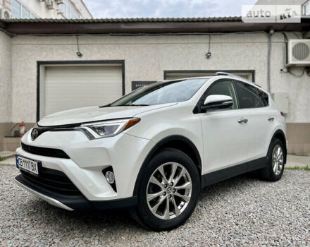 Белый Тойота РАВ 4, объемом двигателя 2.49 л и пробегом 130 тыс. км за 18000 $, фото 1 на Automoto.ua