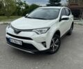 Белый Тойота РАВ 4, объемом двигателя 2.23 л и пробегом 143 тыс. км за 21000 $, фото 1 на Automoto.ua