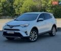 Белый Тойота РАВ 4, объемом двигателя 2.49 л и пробегом 170 тыс. км за 15000 $, фото 1 на Automoto.ua