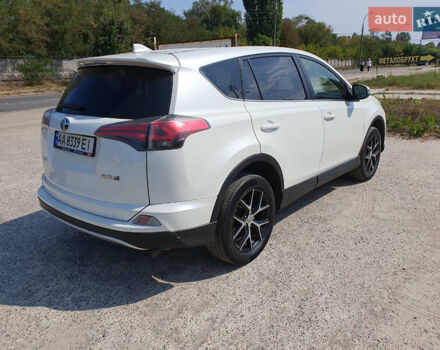 Білий Тойота РАВ 4, об'ємом двигуна 2 л та пробігом 157 тис. км за 22000 $, фото 4 на Automoto.ua