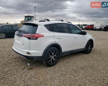 Белый Тойота РАВ 4, объемом двигателя 2.49 л и пробегом 175 тыс. км за 5300 $, фото 3 на Automoto.ua