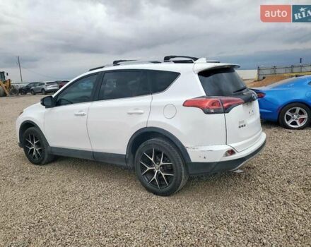 Белый Тойота РАВ 4, объемом двигателя 2.49 л и пробегом 175 тыс. км за 5300 $, фото 2 на Automoto.ua
