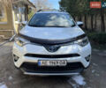 Белый Тойота РАВ 4, объемом двигателя 2.49 л и пробегом 124 тыс. км за 22000 $, фото 1 на Automoto.ua